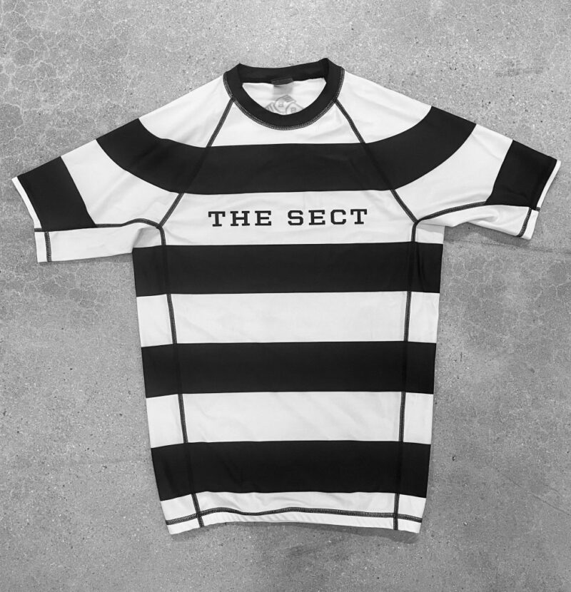 "INSTITUTIONALIZED" Short Sleeve Rashguard